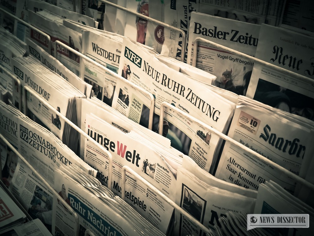 A rack of German newspapers